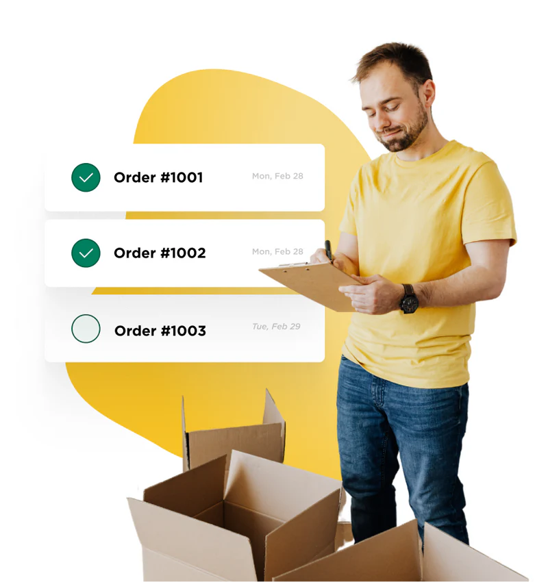 man looking at clipboard